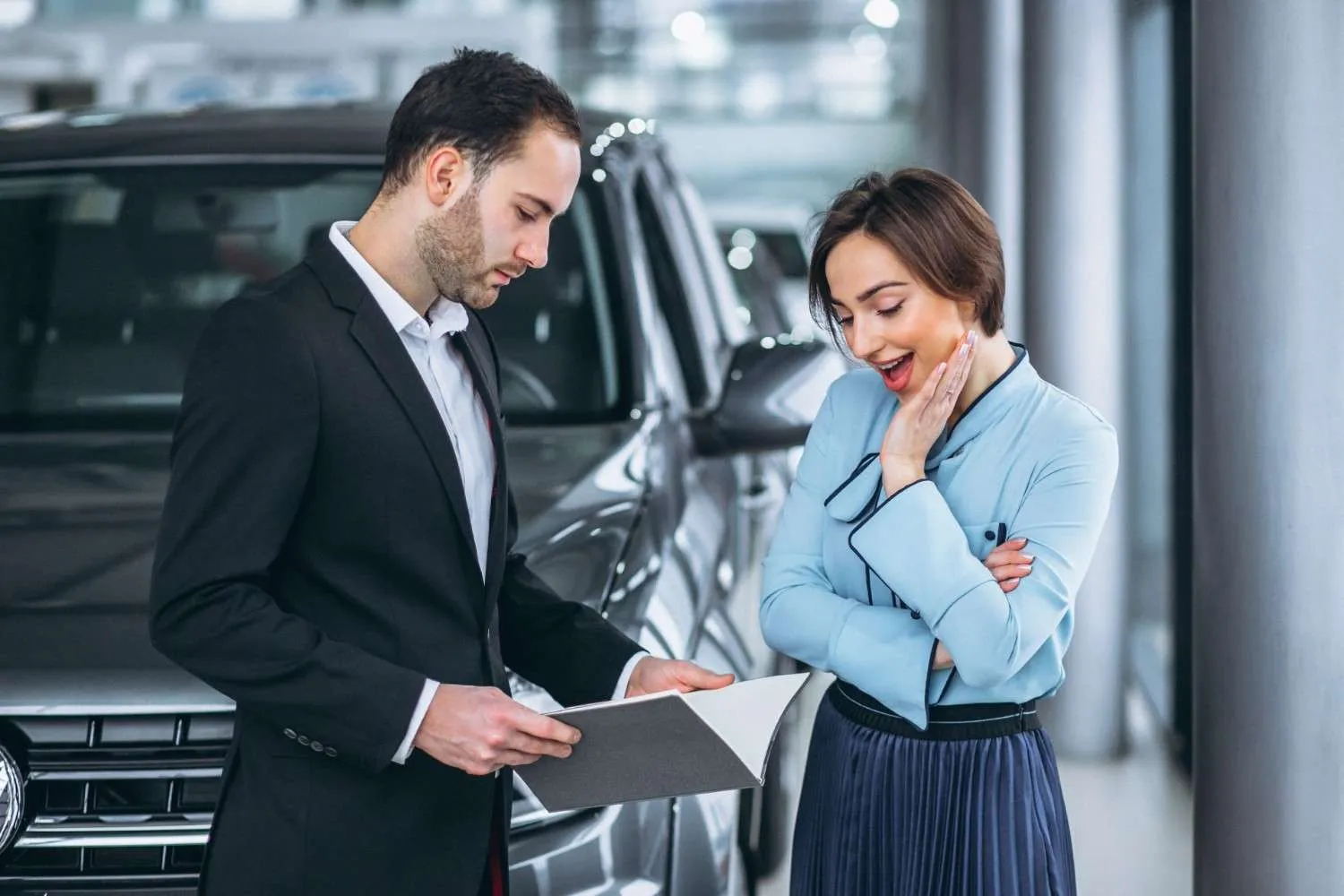 Happy family covered by their auto insurance plan